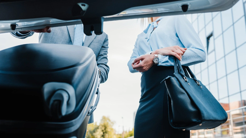 Luxury black car providing transportation from Boston Logan Airport to downtown Boston